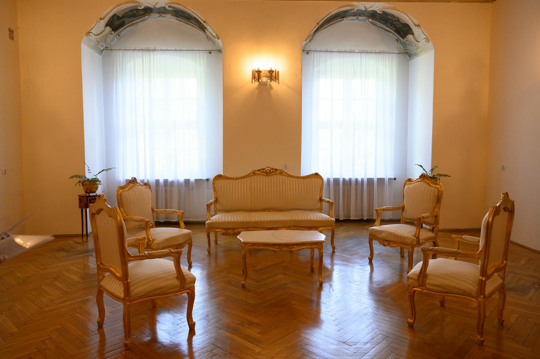 Macro shot of antique mahogany wood grain showing the deep reddish-brown patina and tight grain structure - Antique identification guide