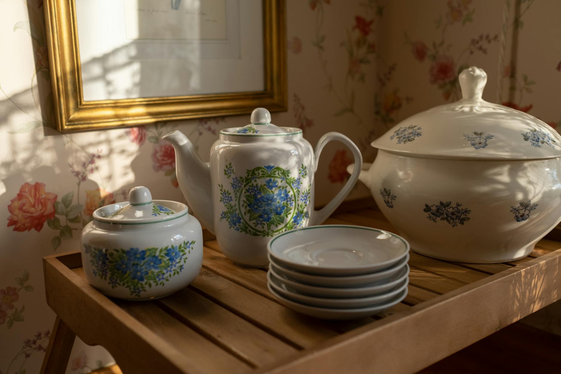 Side-by-side comparison: Left side showing crisp, high-quality Dresden hand-painting; Right side showing a blurry, transfer-printed floral design on a fake - Antique identification guide