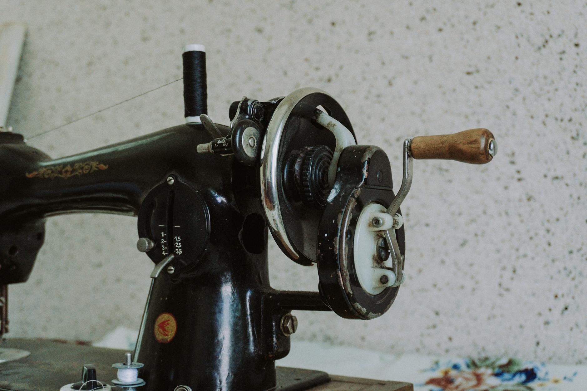 Split comparison image showing one sewing machine with bright, crisp 'Red Eye' decals versus one with faded, silvered-out decals - Antique identification guide
