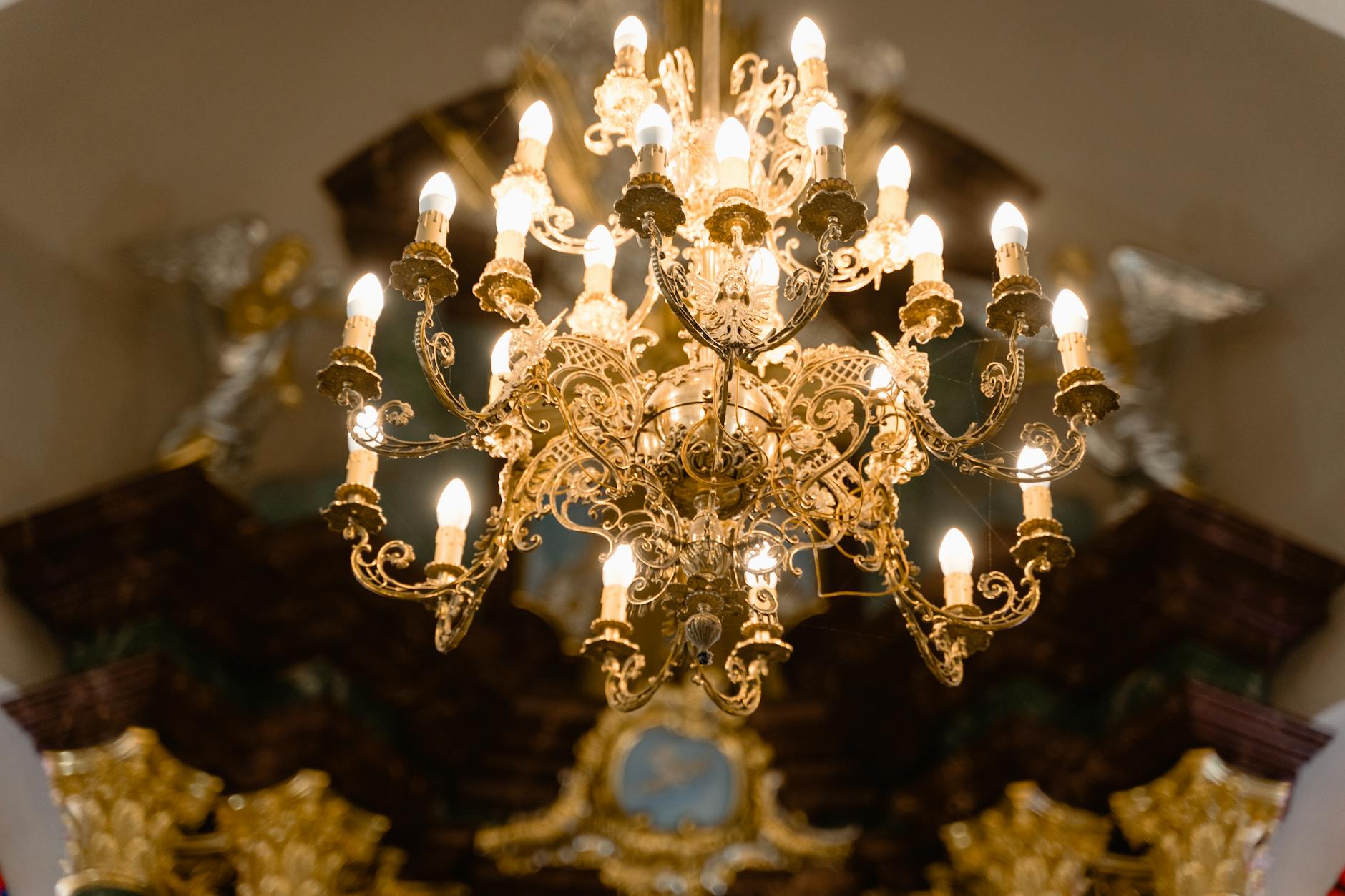 A beautifully arranged 5-piece Wallace Grand Baroque place setting on a dark velvet background to highlight the silver's luster and heavy ornamentation. - Antique identification guide