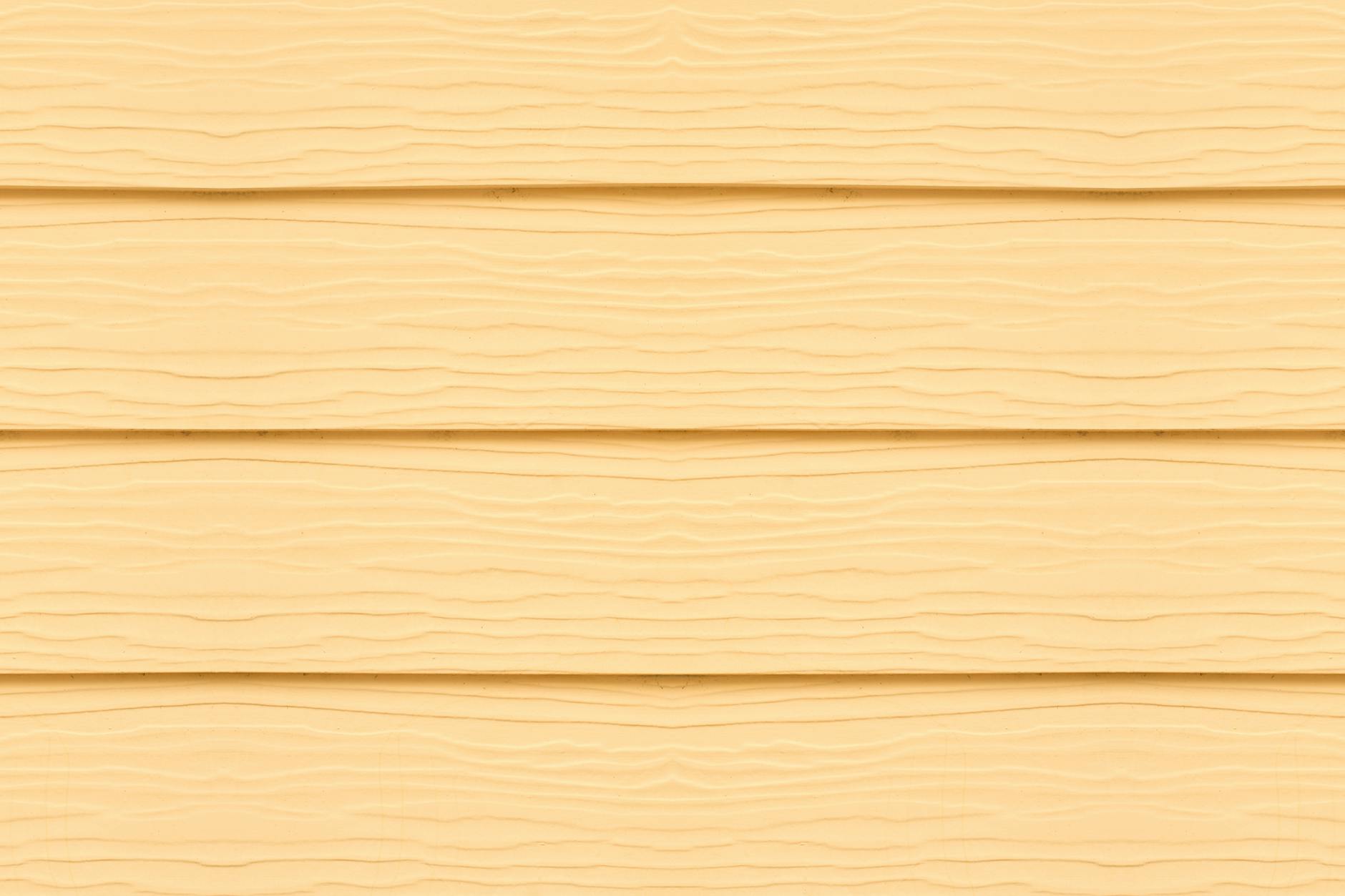 Side-by-side comparison photo showing the glowing, golden-brown grain of huanghuali wood next to the dark, almost black, dense texture of zitan wood. - Antique identification guide